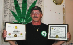 Ed deVries displays his ordination certificate as a minister of the Church of the Universe and the official charter for the Best Plant Believers Mission of Nunavut. The charter document was on the door of the room of his house where guests buy and consume marijuana and derivative products. DeVries argues that room was therefore marked as a church sanctuary which should not have been violated by police. - Gabriel Zarate/NNSL photo